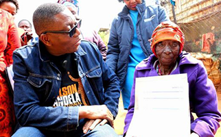 Oldest resident receives Title deed